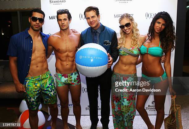 Actor Vincent de Paul and models attend the Ocean Drive Magazine Issue Release Party hosted by cover model Hannah Davis during Mercedes-Benz Fashion...