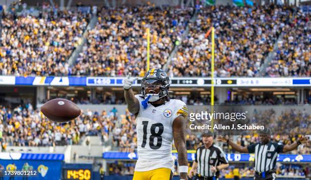 Inglewood, CA Steelers wide receiver Diontae Johnson rallies with a large Steelers fans crowd in attendance after gaining yardage on a play against...
