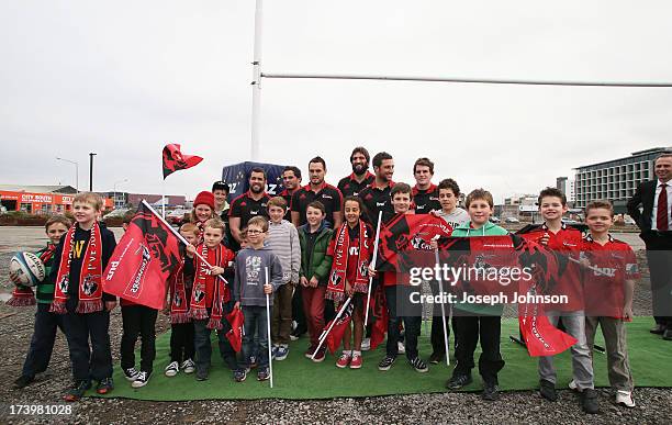 Crusaders players pose for photos with young fans after a media announcement that BNZ will be naming rights sponsor of the Crusaders on July 19, 2013...