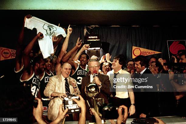 Head coach of the Boston Celtics Red Auerbach and his team celebrate after winning the 1981 NBA Championship on May 14, 1981 in Houston, Texas. The...