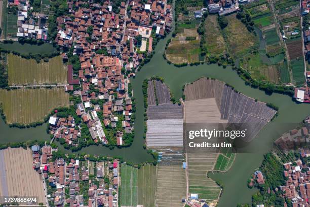 vertical aerial view of rivers, rural areas, and farmland - asia village river stock pictures, royalty-free photos & images