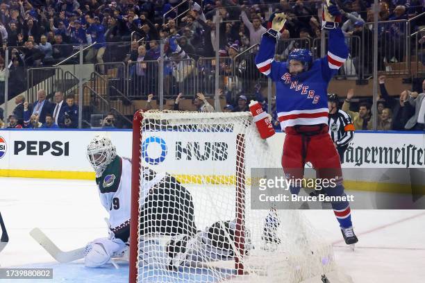 Mika Zibanejad of the New York Rangers celebrates the game winning goal by Vincent Trocheck against Connor Ingram of the Arizona Coyotes at Madison...