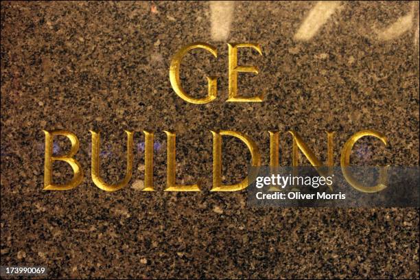 Nighttime view of the entrance of General Electric Building where the NBC Studios and the Rainbow Room are located, with a close-up of the GE...