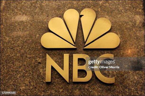 Nighttime view of the NBC logo at the entrance to the General Electric Building where the NBC Studios and the Rainbow Room are located, Midtown...