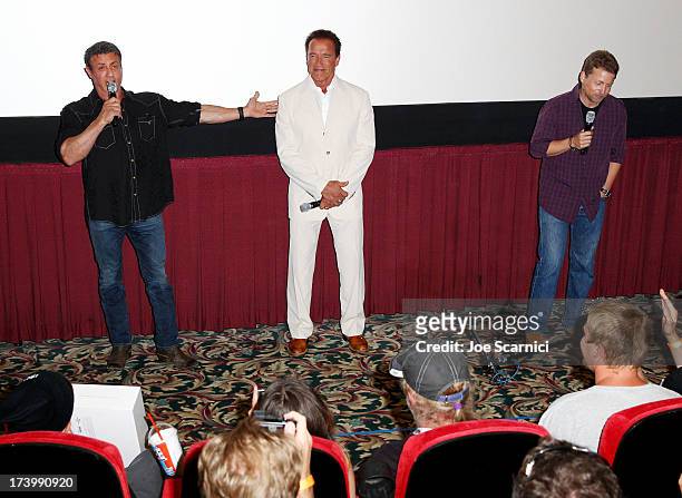 Actors Sylvester Stallone, Arnold Schwarzenegger, and director Mikael Håfström attend the "Escape Plan" screening and red carpet during Comic-Con...