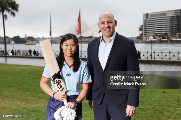 Under 19 cricketer Lauren Kua poses for a photo with Nick Hockley, CEO of Cricket Australia, on the announcement of new program sports for the Los...