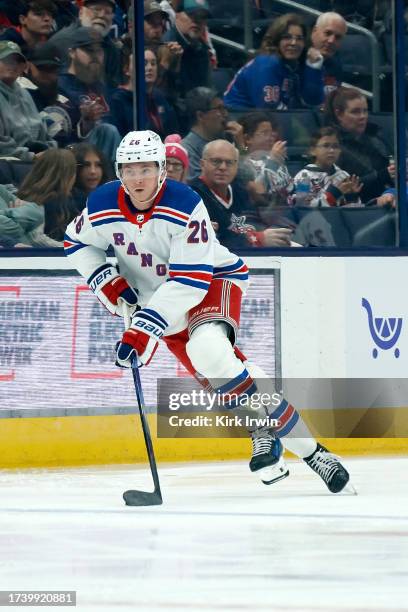 Jimmy Vesey of the New York Rangers controls the puck during the game against the Columbus Blue Jackets at Nationwide Arena on October 14, 2023 in...