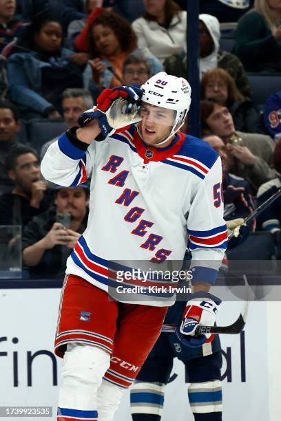 Will Cuylle of the New York Rangers reacts after scoring his first career NHL goal during the game against the Columbus Blue Jackets at Nationwide...