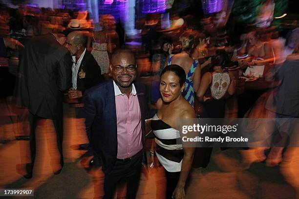 Reel Code Founder Isaac Daniel with CEO Alexia Jones At Mercedes-Benz Fashion Week Swim 2014 - Kick Off Party at Raleigh Hotel on July 18, 2013 in...