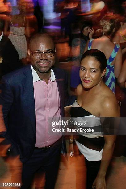 Reel Code Founder Isaac Daniel with CEO Alexia Jones At Mercedes-Benz Fashion Week Swim 2014 - Kick Off Party at Raleigh Hotel on July 18, 2013 in...