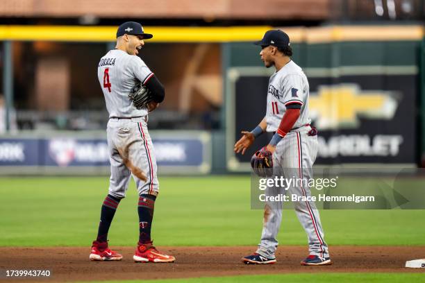 Carlos Correa of the Minnesota Twins celebrates with Jorge Polanco during game two of the Division Series against the Houston Astros on October 8,...