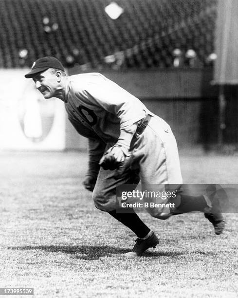 Ty Cobb of the Detroit Tigers fields the ball circa 1920 at Navin Field in Detroit, Michigan.