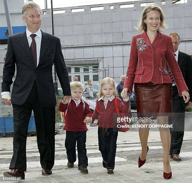 Belgian Princess Elisabeth and Prince Gabriel arrive at Sint-Jan-Berchmans school in Brussels, for the first day, holding the hands of their parents...