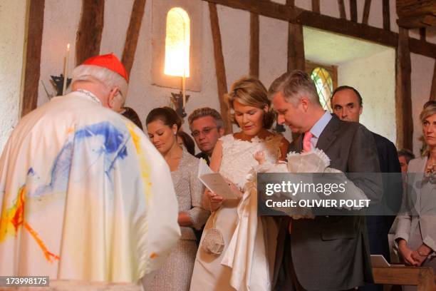 Cardinal Godfried Danneels , Princess Mathilde and Prince Philippe and their daughter Princess Eleonore attend the baptism ceremony of Princess...