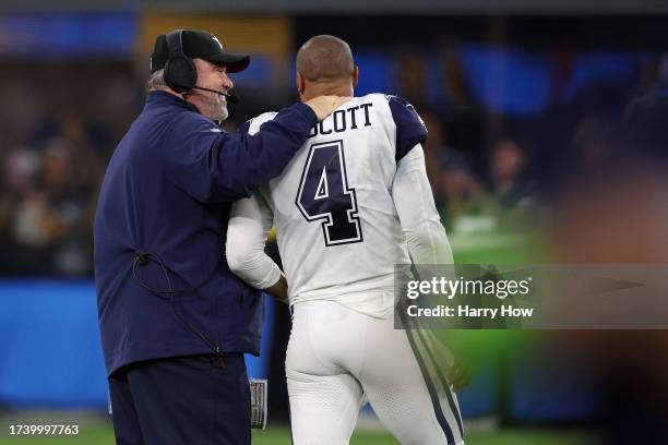 Dallas Cowboys head coach Mike McCarthy and Dak Prescott react after the Dallas Cowboys defeated the Los Angeles Chargers 20-17 at SoFi Stadium on...