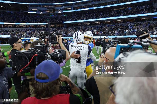 Dak Prescott of the Dallas Cowboys greets Justin Herbert of the Los Angeles Chargers after the Dallas Cowboys defeated the Los Angeles Chargers 20-17...