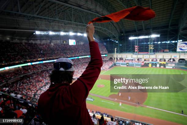 Fan is seen waving a a rally towel during Game 6 of the ALCS between the Texas Rangers and the Houston Astros at Minute Maid Park on Sunday, October...