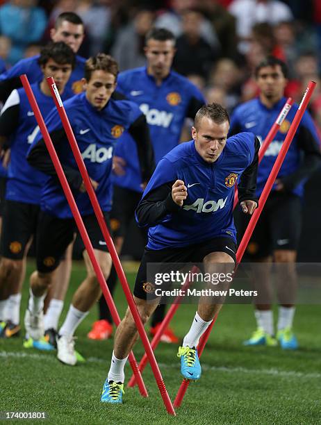 Tom Cleverley of Manchester United in action during a first team training session as part of their pre-season tour of Bangkok, Australia, China,...