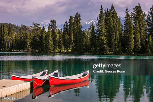 Canoes are available to rent at the Beauvert Lake boathouse at the Fairmont Jasper Park Lodge on June 24, 2013 near Jasper, Alberta, Canada. Jasper...