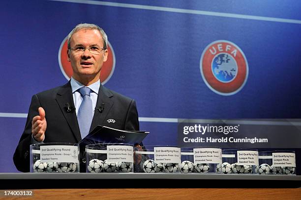 Giorgio Marchetti, UEFA Competition Director, proceeds to the UEFA Champions League Q3 qualifying round draw at the UEFA headquarters on July 19,...