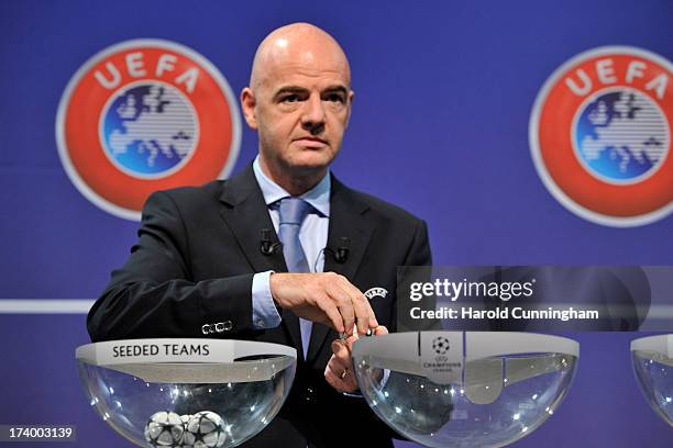Gianni Infantino, UEFA General Secretary, proceeds to the UEFA Champions League Q3 qualifying round draw at the UEFA headquarters on July 19, 2013 in...