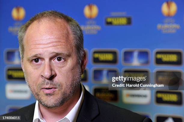 Garry O'Hagan, Hibernian FC Director and Secretary, reacts to the UEFA Champions League Q3 qualifying round draw at the UEFA headquarters on July 19,...