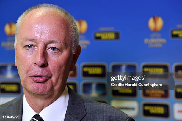 Alun Cowie, Swansea City General Manager, reacts to the UEFA Champions League Q3 qualifying round draw at the UEFA headquarters on July 19, 2013 in...