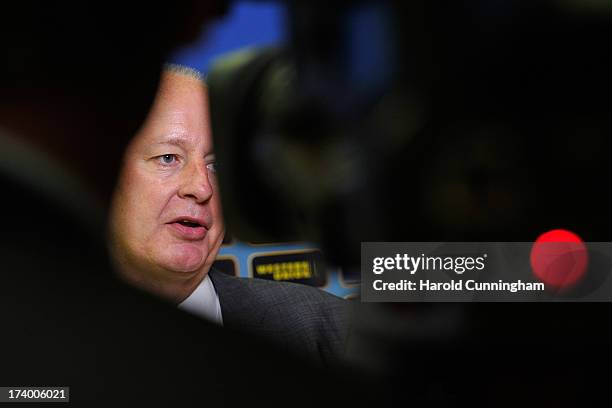 Alun Cowie, Swansea City General Manager, reacts to the UEFA Champions League Q3 qualifying round draw at the UEFA headquarters on July 19, 2013 in...