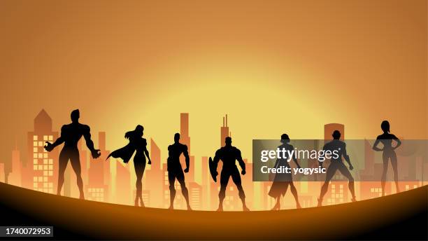 vector superhero team silhouette in a city stock illustration - superhero shadow stock illustrations