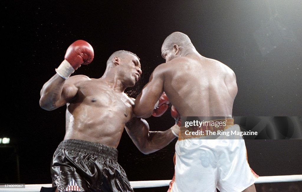 Dunnovan Ruddock Mike Tyson throws a punch against Donovan Ruddock during the fight at ...