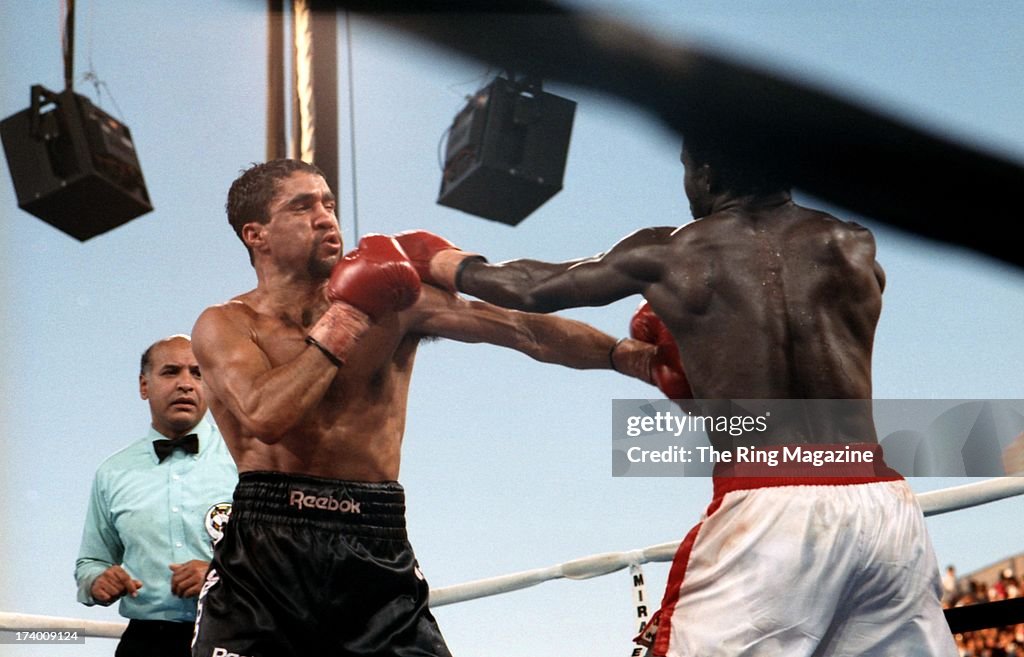Azumah Nelson Throws A Punch Against Jeff Fenech During The Fight At azumah-nelson-throws-a-punch-against-jeff-fenech-during-the-fight-at