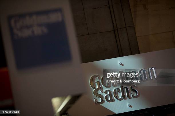 The Goldman Sachs & Co. Logo is displayed at the company's booth on the floor of the New York Stock Exchange in New York, U.S., on Friday, July 19,...