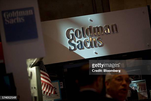 The Goldman Sachs & Co. Logo is displayed at the company's booth on the floor of the New York Stock Exchange in New York, U.S., on Friday, July 19,...