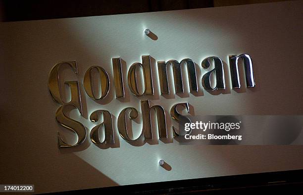 The Goldman Sachs & Co. Logo is displayed at the company's booth on the floor of the New York Stock Exchange in New York, U.S., on Friday, July 19,...