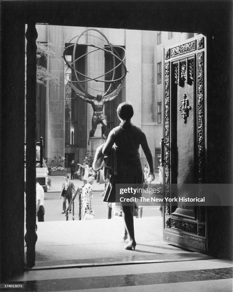 Woman Stepping Through Doorway Of St