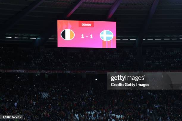 The LED screen inside the stadium displays the score at half time as the the UEFA EURO 2024 European qualifier match between Belgium and Sweden is...