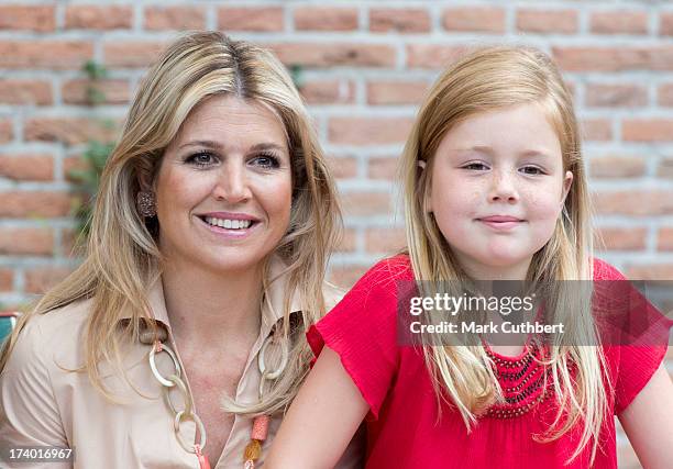 Queen Maxima of the Netherlands and Princess Alexia of the Netherlands attend the annual Summer photocall at Horsten Estate on July 19, 2013 in...