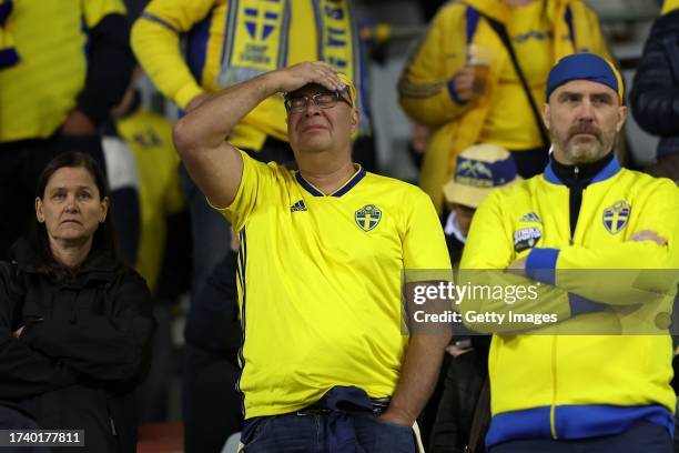 Fans of Sweden react at half time as the the UEFA EURO 2024 European qualifier match between Belgium and Sweden is abandoned at King Baudouin Stadium...