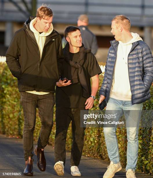 Richmond footballers and part owners Tom Lynch, Jayden Short and Jack Riewoldt after watching Caulfield Cup hope Soulcombe during gallops at...
