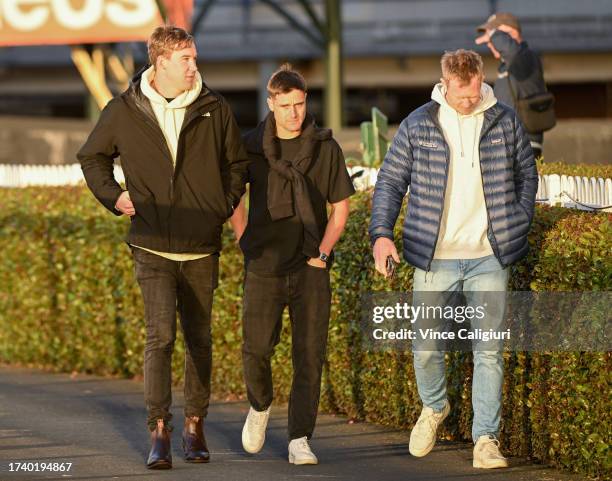 Richmond footballers and part owners Tom Lynch, Jayden Short and Jack Riewoldt after watching Caulfield Cup hope Soulcombe during gallops at...