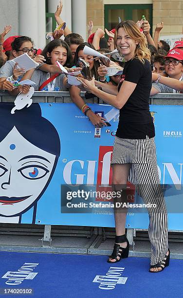 Stefania Rocca signs autographs during the 2013 Giffoni Film Festival Blue Carpet on July 19, 2013 in Giffoni Valle Piana, Italy.