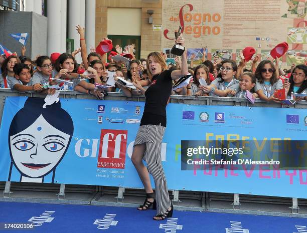 Stefania Rocca poses with the Giffoni Award during the 2013 Giffoni Film Festival on July 19, 2013 in Giffoni Valle Piana, Italy.