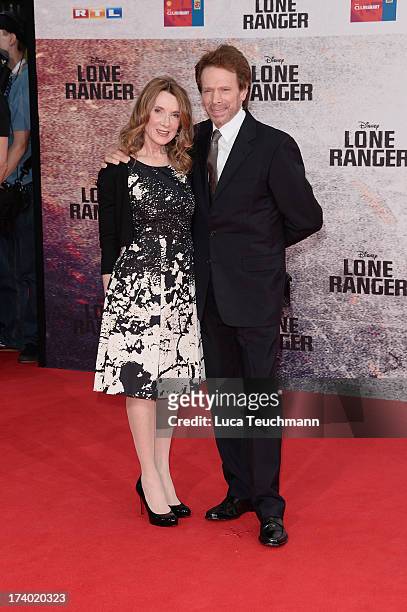 Linda Bruckheimer and Jerry Bruckheimer attend the premiere of 'Lone Ranger' at Sony Centre on July 19, 2013 in Berlin, Germany.