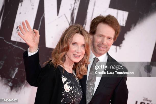 Linda Bruckheimer and Jerry Bruckheimer attend the premiere of 'Lone Ranger' at Sony Centre on July 19, 2013 in Berlin, Germany.