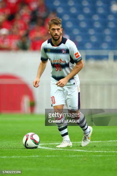 Michele Canini of FC Tokyo in action during the J.League J1 first stage match between Urawa Red Diamonds and FC Tokyo at Saitama Stadium on May 16,...