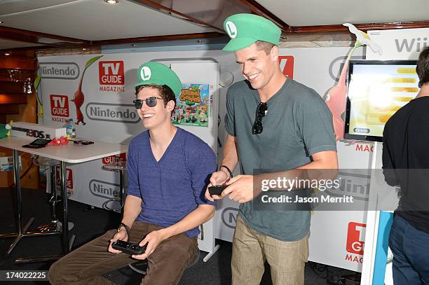 Actors Charlie and Max Carver attends the Nintendo Oasis on the TV Guide Magazine Yacht at Comic-Con day 1 on July 18, 2013 in San Diego, California.