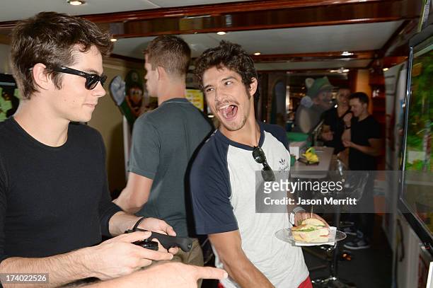 Actors Charlie Carver & Tyler Posey attend the Nintendo Oasis on the TV Guide Magazine Yacht at Comic-Con day 1 on July 18, 2013 in San Diego,...