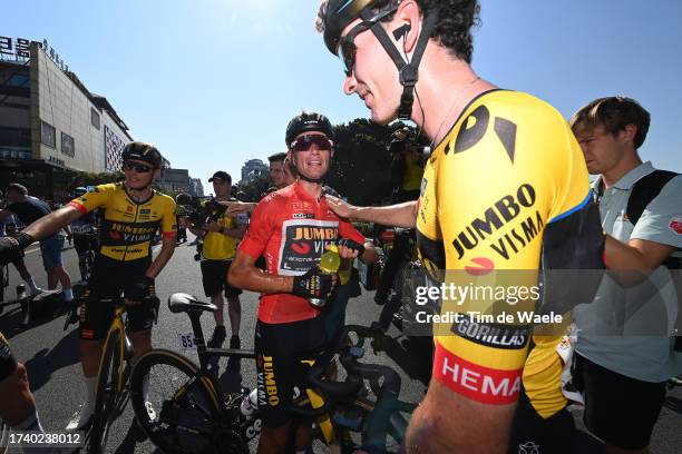 Stage winner Olav Kooij of The Netherlands and Team Jumbo-Visma and Milan Vader of The Netherlands and Team Jumbo-Visma final overall winner react...