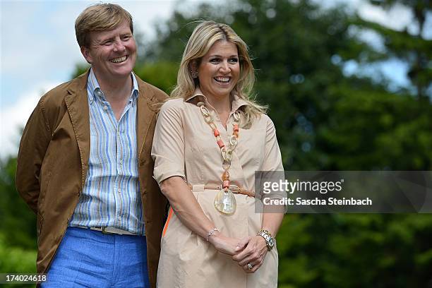 King Willem-Alexander of the Netherlands and Queen Maxima of the Netherlands pose during the annual summer photocall at Horsten Estate on July 19,...