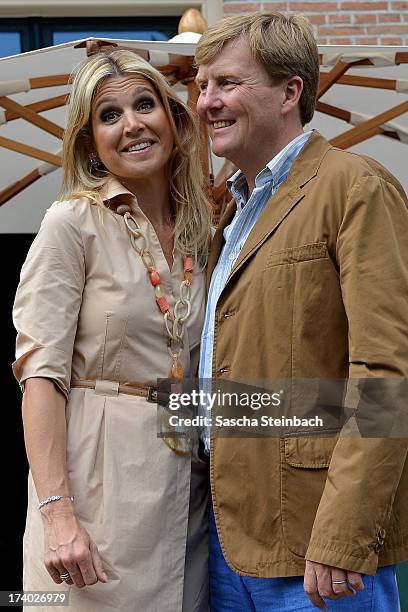 King Willem-Alexander of the Netherlands and Queen Maxima of the Netherlands pose during the annual summer photocall at Horsten Estate on July 19,...